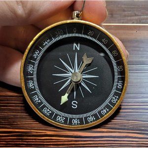 Gold And Black Compass